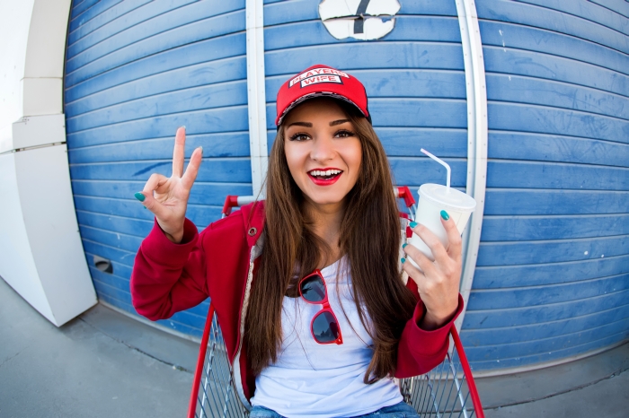 A vibrant & happy young woman enjoying Daylight Savings Time - erthbeet